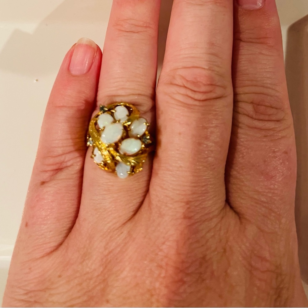 Gold plated ring with opal stones